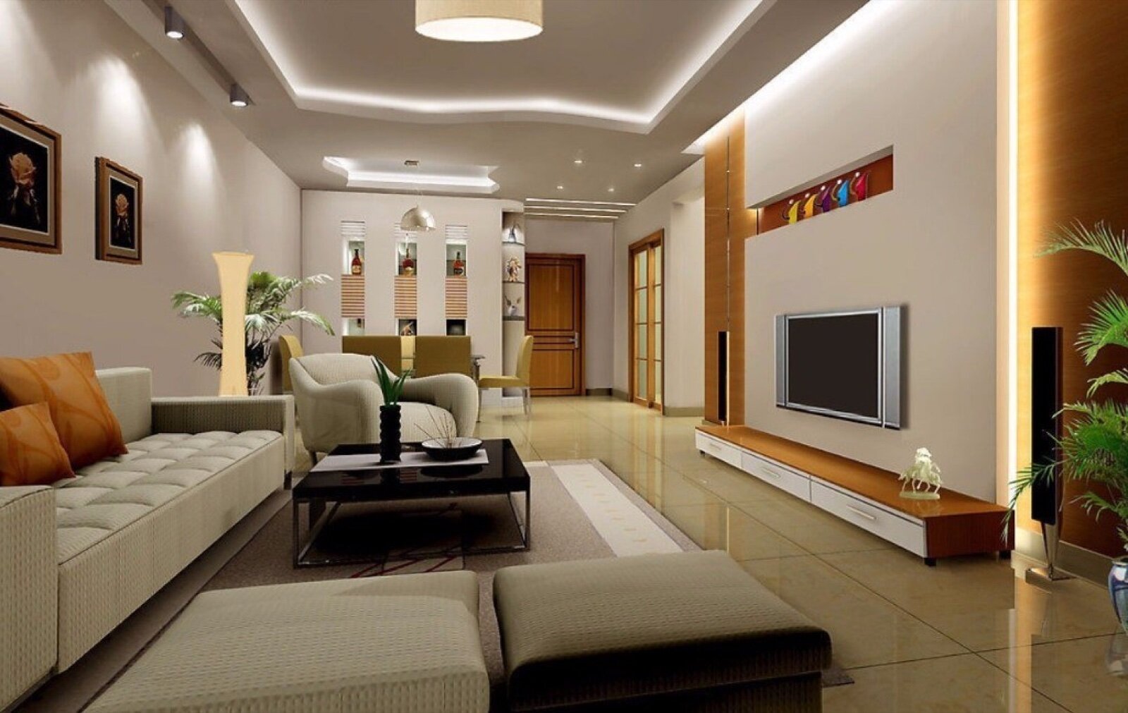 A modern living room with a low sofa, wall-mounted television and recessed ceiling lighting